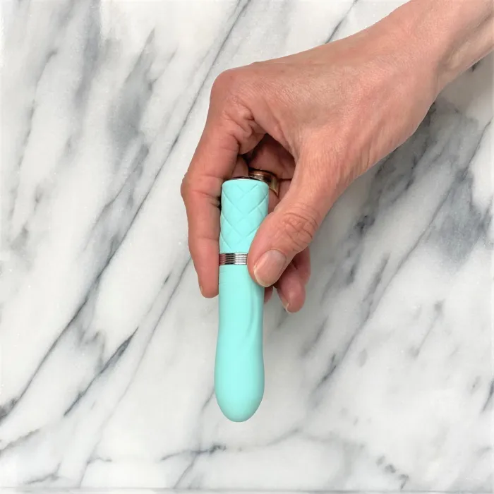 Flirty mini vibrator in hand