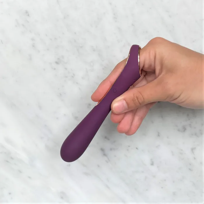 Mini vibrator Mila in hand