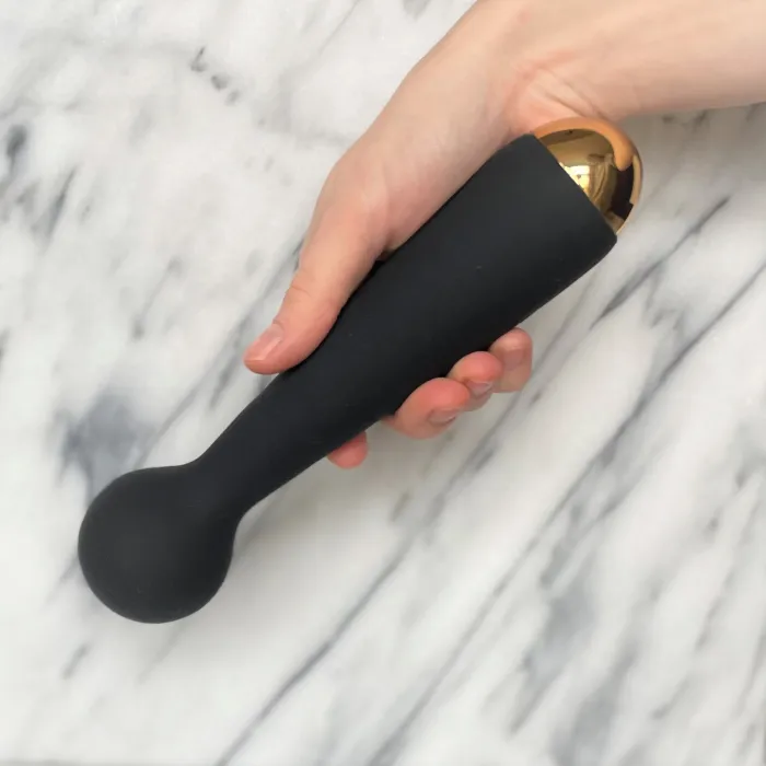 Emma Neo wand massager vibrator in hand