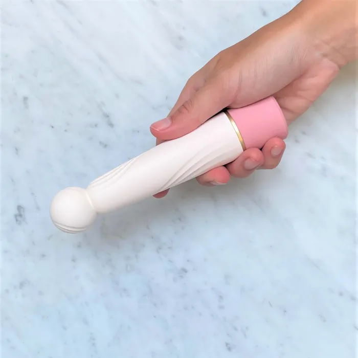 Rin Plus Santo Iroha vibrator in hand