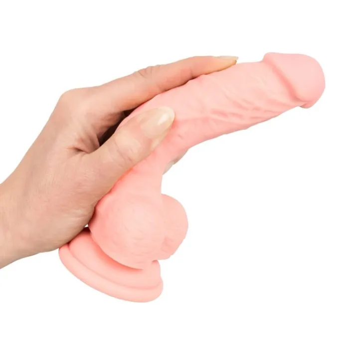 Realistische veilige dildo in hand